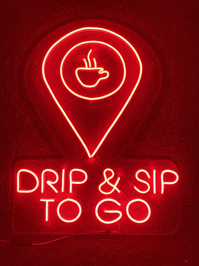 A picture of DRIP & SIP TO GO (Business Neon Logo)